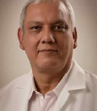 Dr. Carlos G. Arce